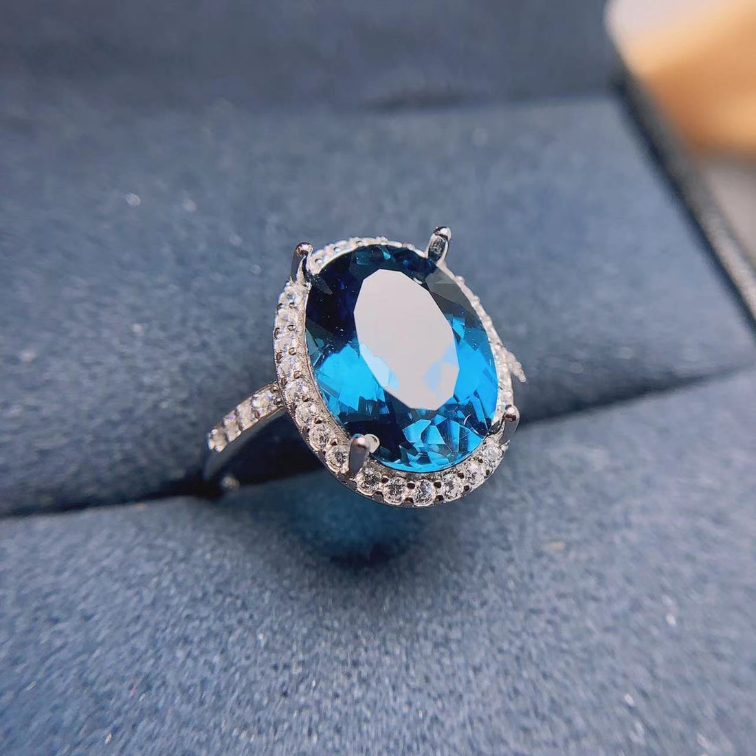 Natural London blue topaz halo ring in 925 sterling silver, oval stone with clear halo