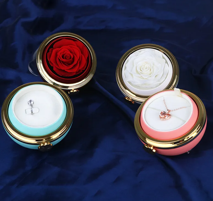 Rotating flower keepsake jewelry box open