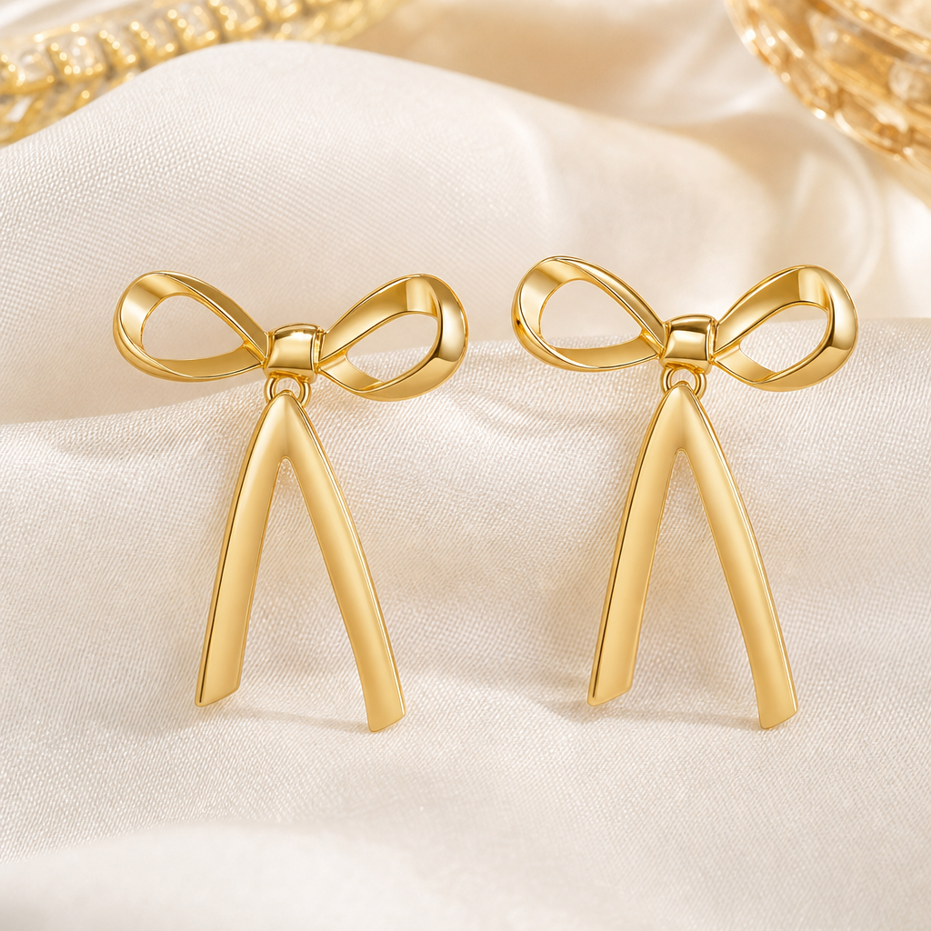 Gold-plated bow earrings with simulated pearl dangles – view 2