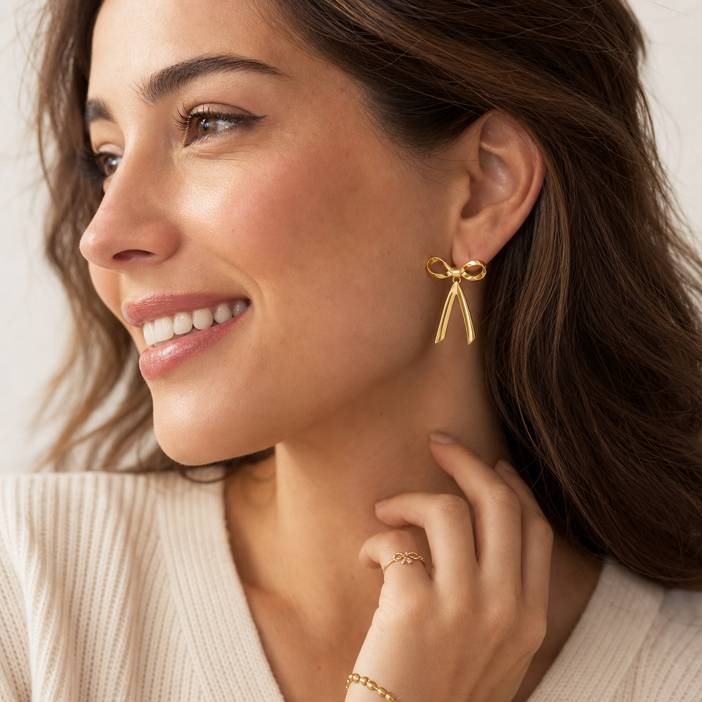 Gold-plated bow earrings with simulated pearl dangles – view 5