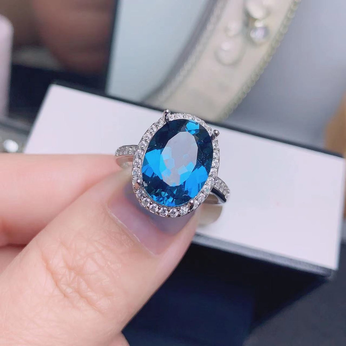 Natural London blue topaz halo ring in 925 sterling silver, oval stone with clear halo