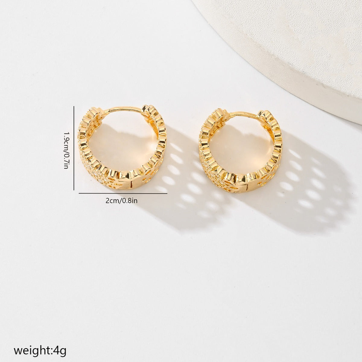 Gold-plated pave huggie hoop earrings, detail of the pave setting
