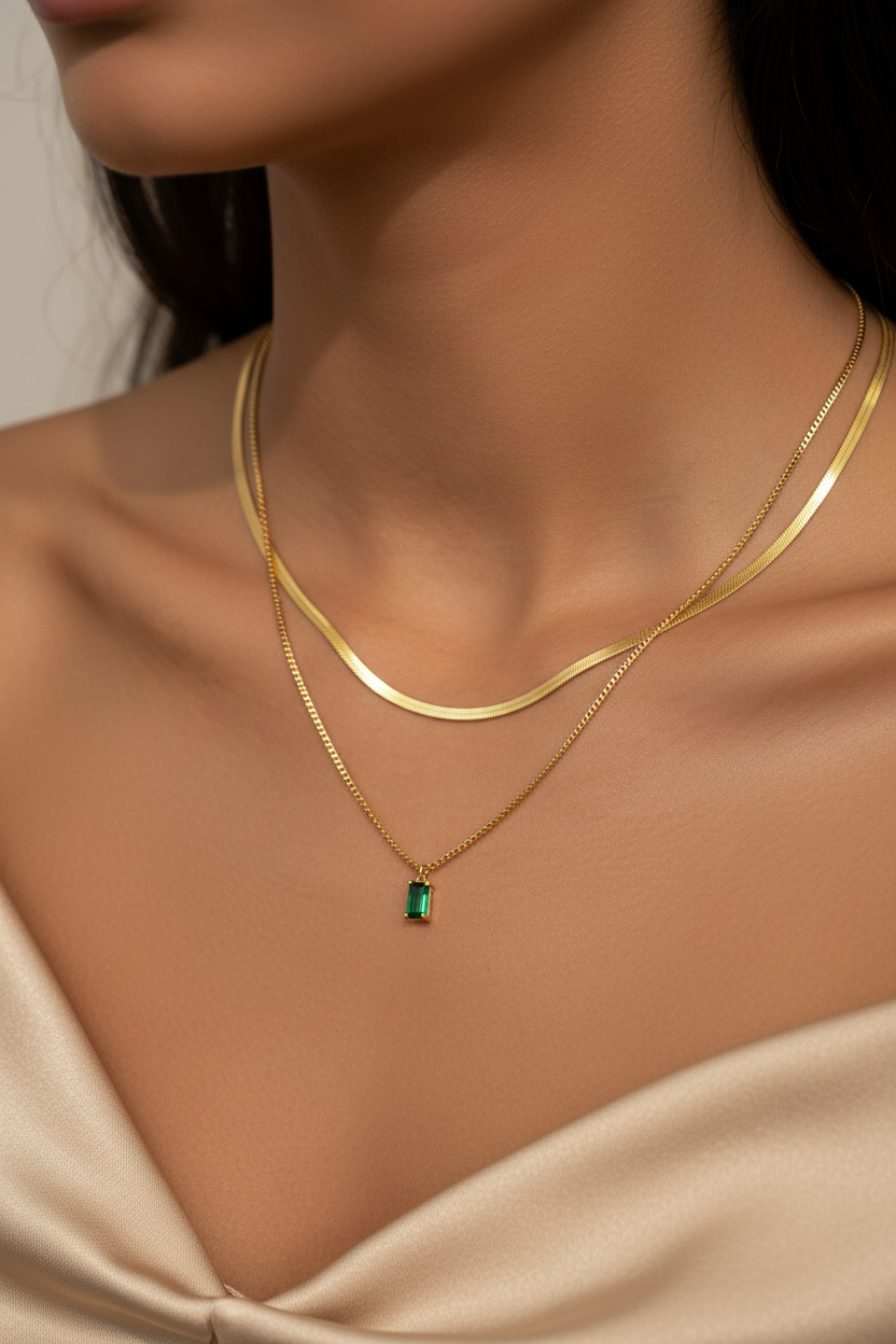 Woman wearing a 14K gold-plated May green layered necklace set