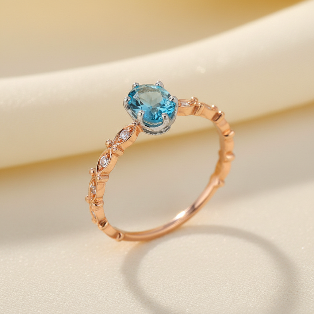 Natural London blue topaz geometric ring in rose gold and white gold on cream background